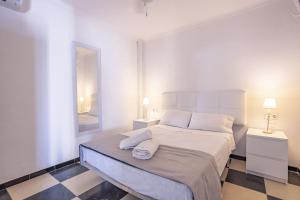 A bed or beds in a room at Sol i Mar 2