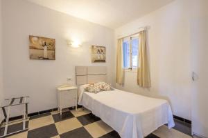 A bed or beds in a room at Sol i Mar 2
