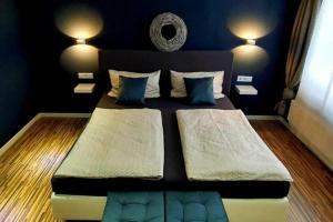 Postel nebo postele na pokoji v ubytování Schicke Ferienwohnung mit Harzblick für 1-2 oder 1-4 Personen + 23 fotografií