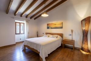 Postel nebo postele na pokoji v ubytování House Can Piu