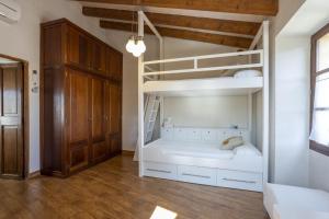 Postel nebo postele na pokoji v ubytování House Can Piu
