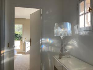 a lamp sitting on a counter in a room at Beautiful Villa Vence Provence in Vence +29 photos