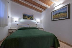 Postel nebo postele na pokoji v ubytování Hotel Valle Verde