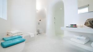 Uma casa de banho em Maregio Suites