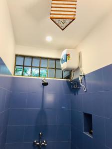 Kúpeľňa v ubytovaní The Canopy Guest House