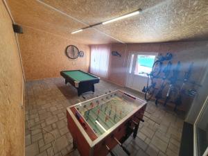 Herňa v ubytovaní Apartmánový dom Stela