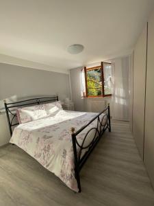 Ein Bett oder Betten in einem Zimmer der Unterkunft Le Due Terrazze