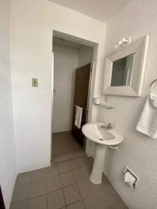 Koupelna v ubytování Porto Rei Residence Hotel