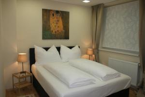 Posteľ alebo postele v izbe v ubytovaní Vienna City Domizil - Apartment