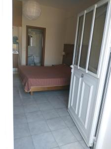 Posteľ alebo postele v izbe v ubytovaní Summer Garden Αpartments & Studios