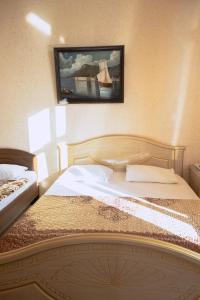 Cama o camas de una habitación en Апартаменты на Ковтюха
