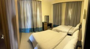 Posteľ alebo postele v izbe v ubytovaní شالية مجهز بالكامل موسي كوست Fully Equipped Chalet Mosa Coast
