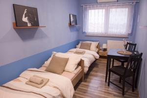 Postel nebo postele na pokoji v ubytování Penzion Veritas