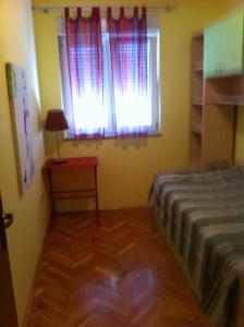 Postel nebo postele na pokoji v ubytování Apartment Vesna