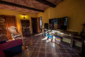 Una televisión o centro de entretenimiento en Casa Espinalbet