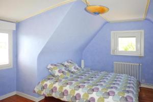 Llit o llits en una habitació de Cottage, Ploubazlanec