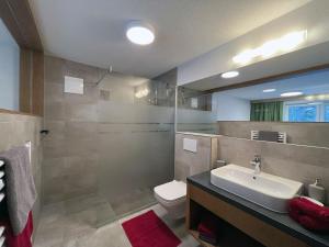 Koupelna v ubytování Appartement Pension Strolz