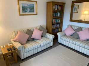 Et opholdsområde på Driftwood Cottage