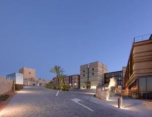 a city street filled with lots of tall buildings at Parador de Lorca in Lorca