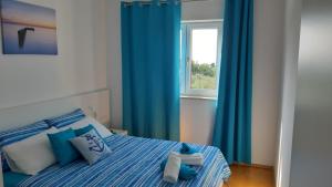 Postel nebo postele na pokoji v ubytování apartment istria