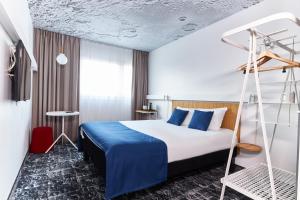 เตียงในห้องที่ ibis Warszawa Centrum