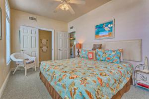 a bedroom with a bed and a ceiling fan at A Blessing by Meyer Vacation Rentals in Fort Morgan