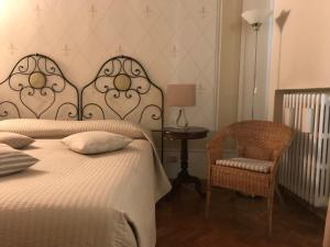 Rúm í herbergi á B&B Artincentro
