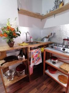 Cucina o angolo cottura di Asiriq Wasi Guest House