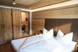 Postel nebo postele na pokoji v ubytování Appartement Pension Strolz