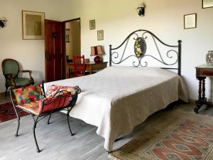 Кровать или кровати в номере Gite U fragnu di Peruccio