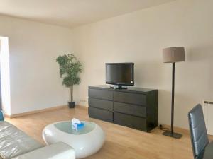 Photo de la galerie de l'établissement Duplex 2 chambres 4 personnes - Bourg de Saclay, à Saclay
