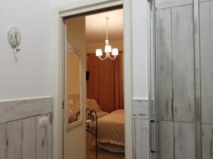 Posteľ alebo postele v izbe v ubytovaní Casale Cisanello