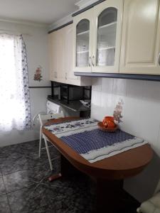 a kitchen with a table with a bowl on it at Amplio piso en Sagunto in Sagunto