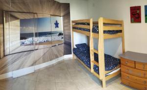 Postel nebo postele na pokoji v ubytování Villa Carroubier