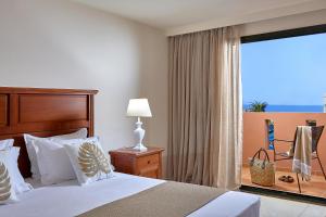 Vasia Resort & Spa客房内的一张或多张床位