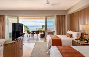 TV a/nebo společenská místnost v ubytování Grand Velas Riviera Maya - All Inclusive