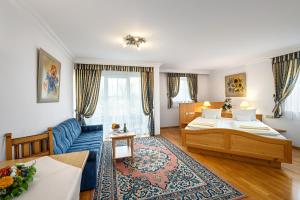 Postel nebo postele na pokoji v ubytování Hotel Preishof