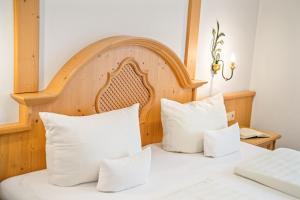 Postel nebo postele na pokoji v ubytování Hotel Preishof