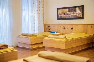 Postel nebo postele na pokoji v ubytování Hotel Preishof