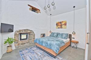 Ein Bett oder Betten in einem Zimmer der Unterkunft Villa Marušići 2140