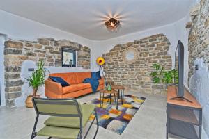 Ein Sitzbereich in der Unterkunft Villa Marušići 2140