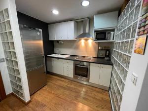 Kuchyňa alebo kuchynka v ubytovaní APARTAMENTO PINAR de MONTEMAR