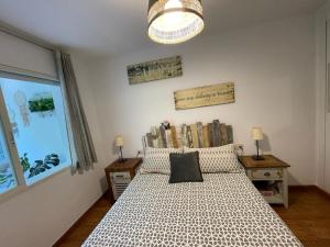 Posteľ alebo postele v izbe v ubytovaní APARTAMENTO PINAR de MONTEMAR
