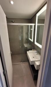 Phòng tắm tại Alphaville Stay Residences