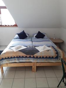 Voodi või voodid majutusasutuse Béke Stúdió Apartman toas