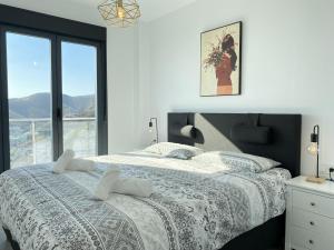 Posteľ alebo postele v izbe v ubytovaní Penthouse Balcon del Mar 124 Casasol + 37 fotografií