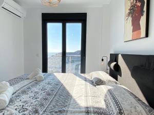 Posteľ alebo postele v izbe v ubytovaní Penthouse Balcon del Mar 124 Casasol