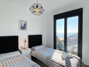 Posteľ alebo postele v izbe v ubytovaní Penthouse Balcon del Mar 124 Casasol