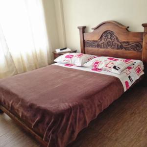 Ein Bett oder Betten in einem Zimmer der Unterkunft Hotel Susagua