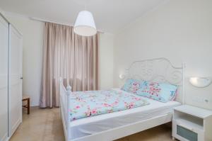 Ένα ή περισσότερα κρεβάτια σε δωμάτιο στο Apartmani Josip